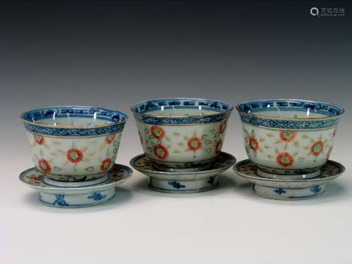Three Chinese porcelain cups.