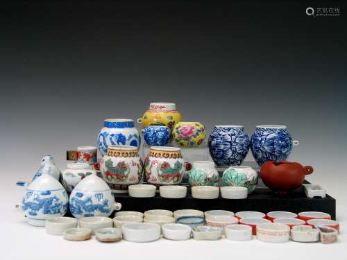 Group of Chinese porcelain bird feeders.
