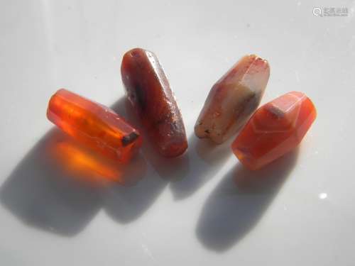 Four Antique Carnelian Beads