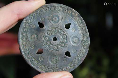 Ancient perforated Islamic bronze pendant-mirror with 5 holes, c.1000-1100 AD