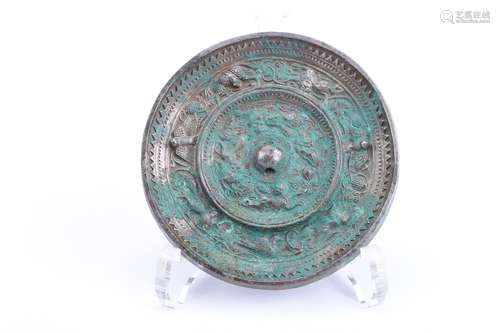 A CHINESE BRONZE MIRRO