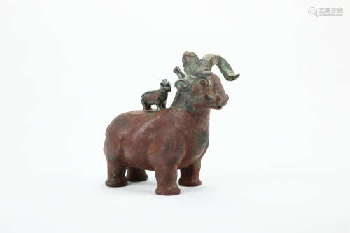 A CHINESE BRONZE COW DECORATION