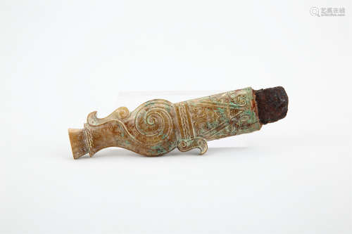 A CHINESE CARVED JADE SWORD PENDANT