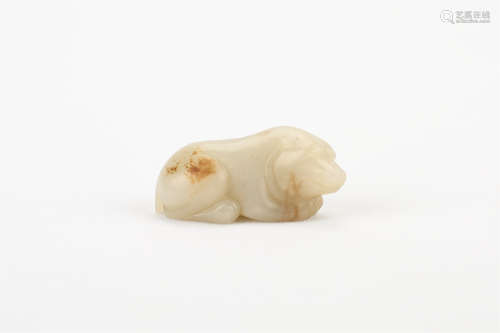 A CHINESE CARVED WHITE JADE BEAR PENDANT