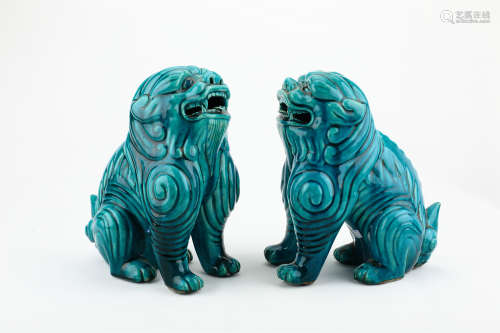 A PAIR OF CHINESE BLUE GALZED LIONS