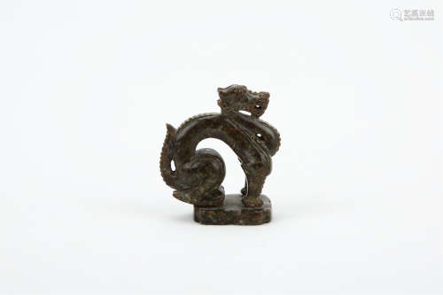 A CHINESE CARVED JADE DRAGON DECORATION
