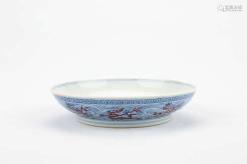 A CHINESE BLUE AND WHITE PORCELAIN BOWL WITH IRON-RED DRAGON PATTERN