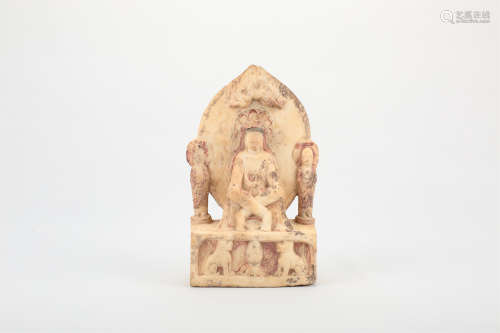 A CHINESE CARVED STONE FIGURE