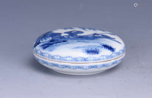 A BLUE AND WHITE CIRCULAR INK BOX AND COVER