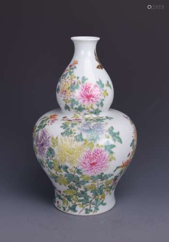 A FAMILLE ROSE DOUBLE GOURD VASE