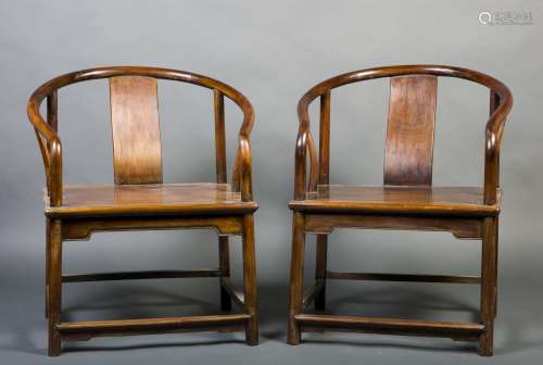 A PAIR OF REDWOOD HORSESHOE-BACK ARMCHAIRS