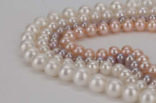 FOUR STRANDS OF CULTURED PEARL NECKLACE