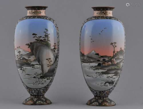 Pair of Cloisonné vases. Japan. Meiji period (1868-1912). Silver wire work. Decoration of landscapes and geese with flowers. Borders of floral scrolling. 9