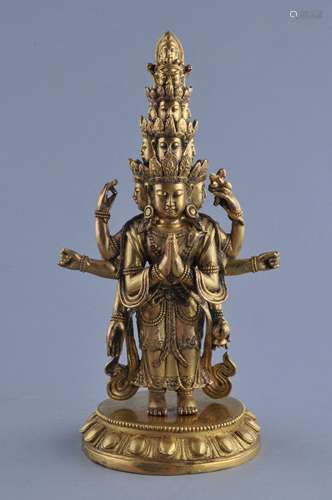 Gilt bronze Image. China. 19th century. Figure of Ekadasuralokeshvara. The eleven headed Kuan Yin. Two piece. 8-1/2