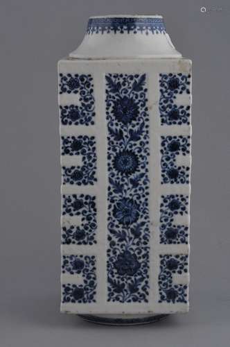 Soft-paste Vase. China. 18th/19th century. Tsung shaped. Underglaze blue decoration of flowers on a crackled ground. 11-3/4