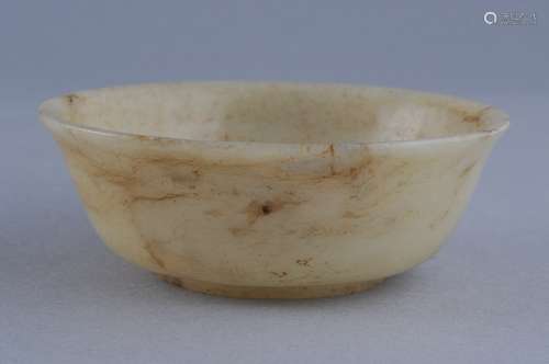 Jade bowl. 19th century or earlier. Yellow stone with brown striations. 3-3/4