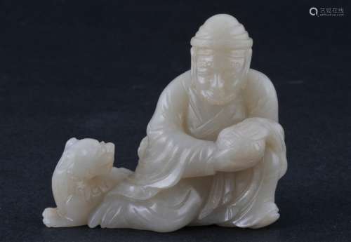 Jade carving. China. 19th century. White stone. Carving of Daruma playing ball with a Foo Dog. 2-3/4