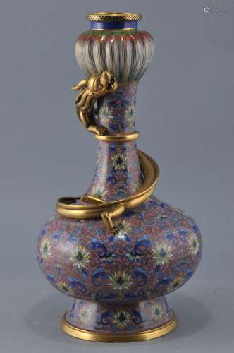 Cloisonné vase. China. Early 20th century. Garlic mouth top. Decoration of stylized lotus scrolling on a pink ground. Gilt dragon swirling about the neck. Signed. 11-1/2
