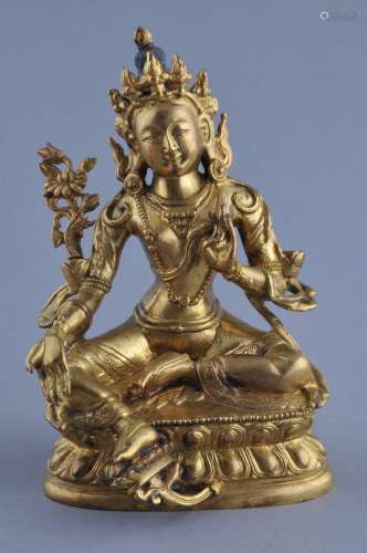 Gilt bronze Image. China. 18th/19th century. Seated figure of Tara. (One floral element missing). 6-1/4