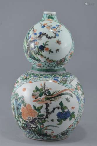 Porcelain vase. China. Late 19th to early 20th century. Double gourd shape. Famille verte decoration of birds and flowers reserves on a 