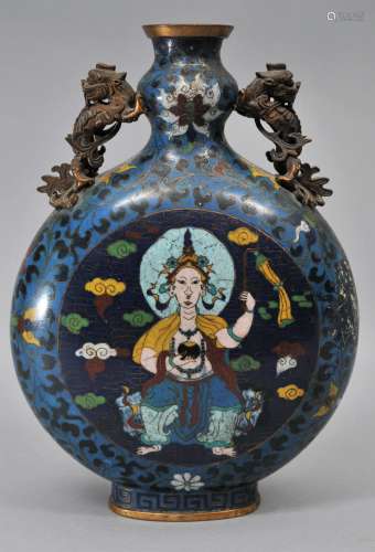 Cloisonné vase. China. 18th century. Moon flask form with foo dog handles. Buddhist deities with stylized lotus borders. (Old repair to one side). 11-1/4