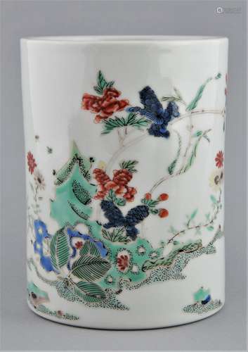 Porcelain brush pot. China. 18th century. Cylindrical form. Famille Verte decoration of fantastic rocks and flowers. 5-1/2