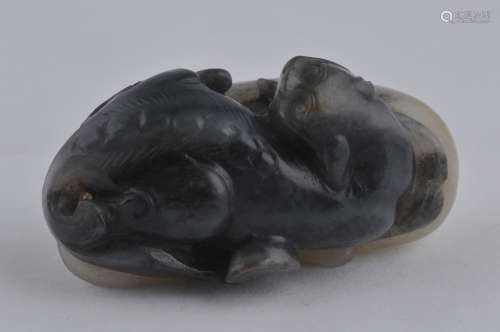 Jade carving. China. 18th century. Black and white Jade. Pair of Chih Lung. 2-1/2