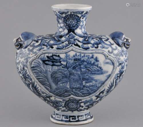 Porcelain vase. China. Late 19th century. Heart shaped with foo dog masks. Landscape reserves and borders of dragons and flowers in underglaze blue. Ch'ia Ch'ing mark on the base.  8-1/2