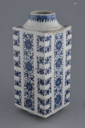 Soft-paste Vase. China. 18th/19th century. Tsung shaped. Underglaze blue decoration of flowers on a crackled ground. 11-3/4