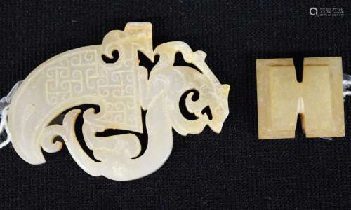 Lot of two Jades. China. 18th century or earlier. A square plaque and a knot picker with a dragon. Largest- 2-1/4