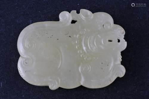 Jade pendant. China. 19th century. Highly translucent yellow stone. Carving of a tiger. 1-3/4