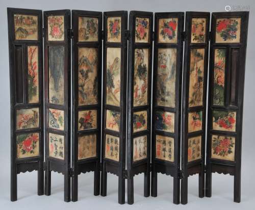 Eight panel table screen. China. 19th century. Marble panels painted with the Immortals, animals and children. 25