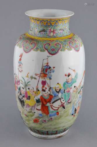 Porcelain vase. China. Early 20th century. Famille Rose decoration of children playing. Ch'ien Lung mark. Drilled as a lamp. 11-1/4