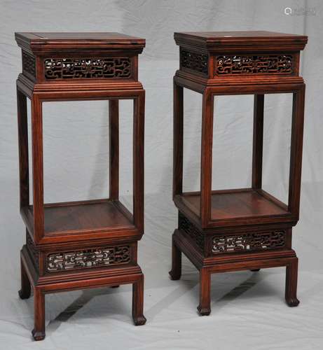 Pair of tall stands. China. Early 20th century. Rosewood with carved and pierced with scroll work. Height- 35-1/2