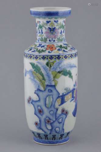 Porcelain vase. China. Early 20th century. Roleau form. Tou Tsai decoration of children playing. Ch'ien Lung mark on the base. 11