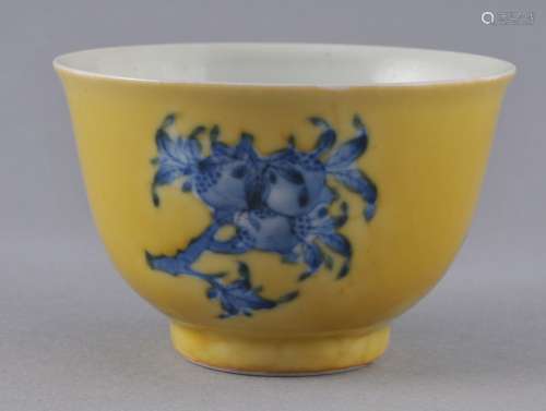 Porcelain cup. China. Early 20th century. Yellow ground with underglaze blue decoration of 