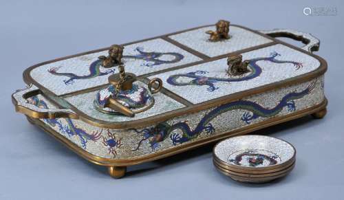 Smoking set. China. Early 20th century. White ground Cloisonné decorated with dragons. 14