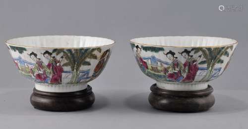 Pair of porcelain bowls. China. Hsien Feng. (1851-1861) and of the period. Ribbed body with Famille Rose enamel decoration of women. 6