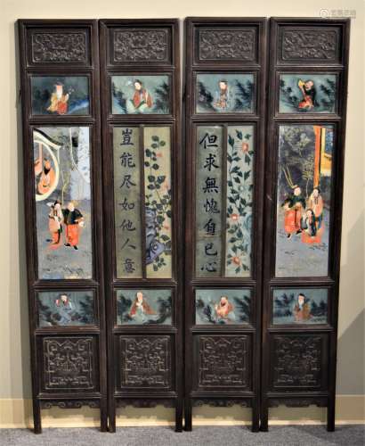 Hung Mu Rosewood four panel screen. China. 19th century. Having relief carvings depicting o (bats) and double fish motif along with reverse glass painted scenes of figures from literature including two mirrored panels. 52-3/4