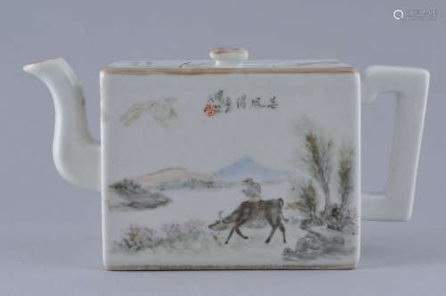 Porcelain wine pot. China. Republican Period. Rectangular form. Decoration of a boy on a water buffalo and a bird eating clams. With calligraphy. 7