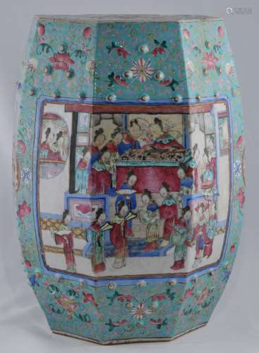 Porcelain garden seat. China. 19th century. Hexagonal form with pierced cash coins and bosses. Famille Rose decoration of women in room interiors on the floral strewn turquoise ground. Repaired. 19
