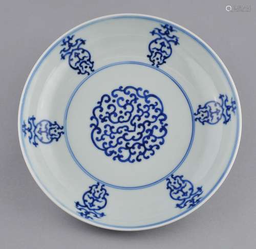 Porcelain dish. China. Hsuan Tung mark and probably of the period. Underglaze blue decoration. Ju-i scrolling. 8-1/2
