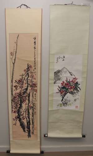 Two scroll paintings. China. 20th century. Ink and slight colours on paper. One of flowering tree on gold flecked paper, the other a landscape with pink azalea flowers.   (1) Scene size: 51-1/2