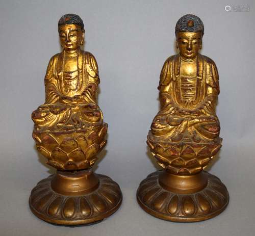 Pair of carved wooden Buddha's. China. 19th century.  Gilt seated figures on lotus thrones. 6