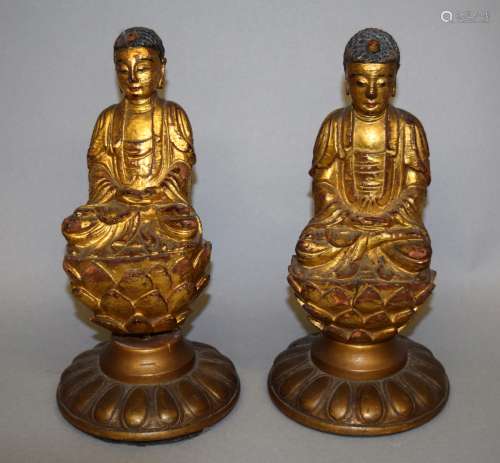 Pair of carved wooden Buddha's. China. 19th century.  Gilt seated figures on lotus thrones. 6