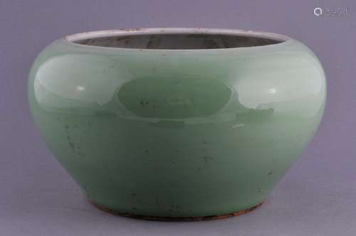 Porcelain bowl. China. 19th century. Begging bowl form. Celadon green glaze. 9-1/2