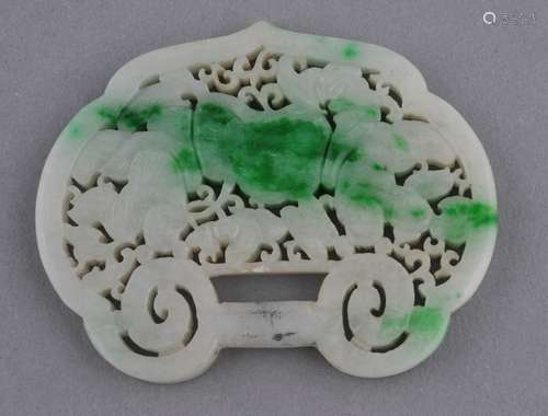 Jade pendant. China. 19th century. White Jade with emerald green markings. Lock shaped carved and pierced with the Ho ho erh hsien and lotus plants. 2-3/4