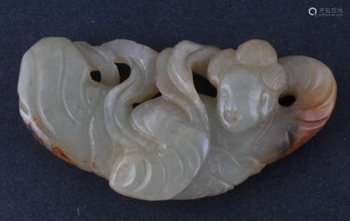 Jade  carving. China. 18th century. Pale celadon coloured stone with russet markings. Carving of an apsara. 2-3/4
