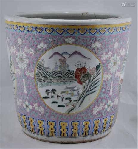 Porcelain planter. China. 19th century. Famille Rose reserves of landscapes on a lavender ground with stylized lotus scrolls. (Chip on the inside of the mouth). 15