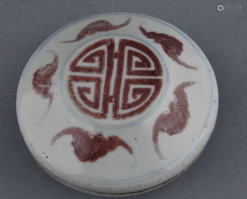 Porcelain Incense Box. China. 19th century. Underglaze blue and red decoration of bats and a shou character. 3-1/4